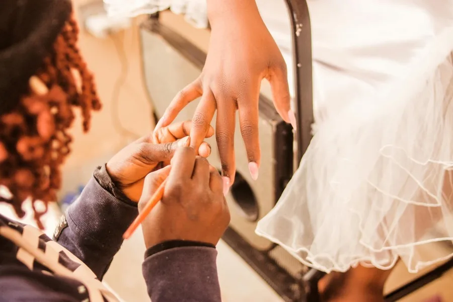 Nail technician doing a manicure